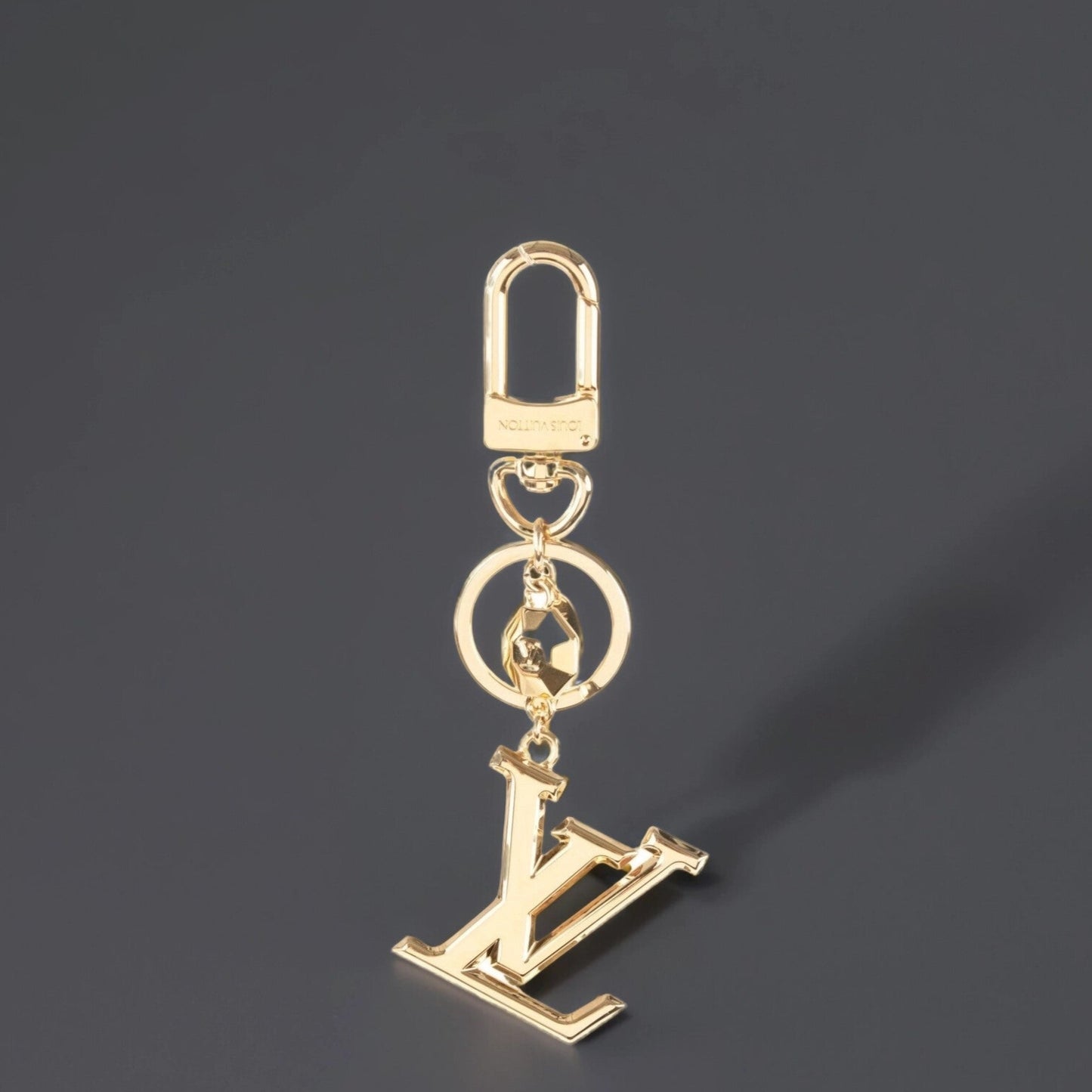 LV Facettes Bag Charm Key Holder Gold