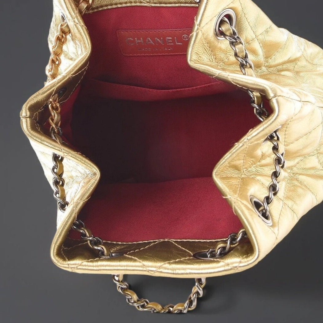 Metallic Aged Calfskin Quilted Gabrielle Backpack Gold