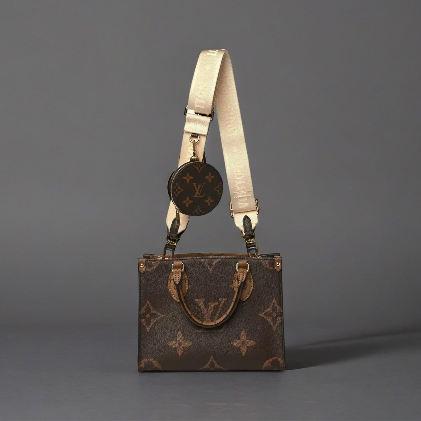 Reverse Monogram Giant Onthego PM